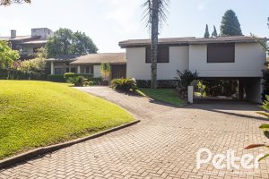 Casa em Condomínio à venda com 328m², 3 dormitórios, 2 suítes, 4 vagas, no bairro Cavalhada em PORTO ALEGRE