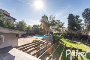 Casa em Condomínio à venda com 328m², 3 dormitórios, 2 suítes, 4 vagas, no bairro Cavalhada em PORTO ALEGRE