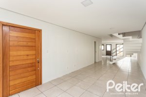 Casa em Condomínio à venda com 352m², 3 dormitórios, 3 suítes, 3 vagas, no bairro Tristeza em Porto Alegre