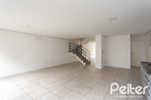 Casa em Condomínio à venda com 352m², 3 dormitórios, 3 suítes, 3 vagas, no bairro Tristeza em Porto Alegre