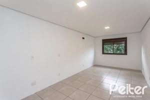Casa em Condomínio à venda com 352m², 3 dormitórios, 3 suítes, 3 vagas, no bairro Tristeza em Porto Alegre