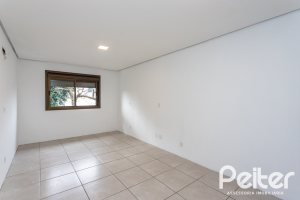Casa em Condomínio à venda com 352m², 3 dormitórios, 3 suítes, 3 vagas, no bairro Tristeza em Porto Alegre