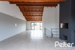 Casa em Condomínio à venda com 352m², 3 dormitórios, 3 suítes, 3 vagas, no bairro Tristeza em Porto Alegre