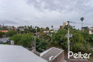 Casa em Condomínio à venda com 352m², 3 dormitórios, 3 suítes, 3 vagas, no bairro Tristeza em Porto Alegre