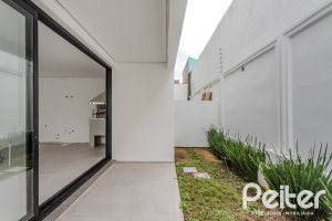 Casa em Condomínio à venda com 150m², 3 dormitórios, 3 suítes, 2 vagas, no bairro Ipanema em Porto Alegre