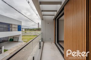 Casa em Condomínio à venda com 150m², 3 dormitórios, 3 suítes, 2 vagas, no bairro Ipanema em Porto Alegre