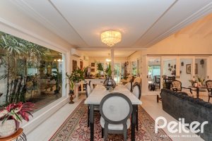 Casa em Condomínio à venda com 296m², 3 dormitórios, 1 suíte, 4 vagas, no bairro Terra Ville em PORTO ALEGRE