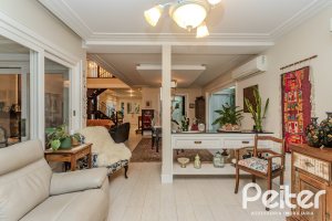 Casa em Condomínio à venda com 296m², 3 dormitórios, 1 suíte, 4 vagas, no bairro Terra Ville em PORTO ALEGRE