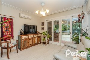 Casa em Condomínio à venda com 296m², 3 dormitórios, 1 suíte, 4 vagas, no bairro Terra Ville em PORTO ALEGRE