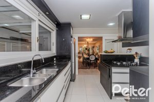 Casa em Condomínio à venda com 296m², 3 dormitórios, 1 suíte, 4 vagas, no bairro Terra Ville em PORTO ALEGRE