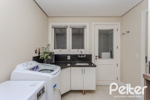 Casa em Condomínio à venda com 296m², 3 dormitórios, 1 suíte, 4 vagas, no bairro Terra Ville em PORTO ALEGRE