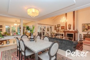 Casa em Condomínio à venda com 296m², 3 dormitórios, 1 suíte, 4 vagas, no bairro Terra Ville em PORTO ALEGRE