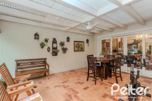 Casa em Condomínio à venda com 296m², 3 dormitórios, 1 suíte, 4 vagas, no bairro Terra Ville em PORTO ALEGRE