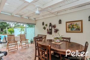 Casa em Condomínio à venda com 296m², 3 dormitórios, 1 suíte, 4 vagas, no bairro Terra Ville em PORTO ALEGRE