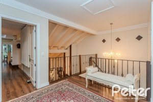 Casa em Condomínio à venda com 296m², 3 dormitórios, 1 suíte, 4 vagas, no bairro Terra Ville em PORTO ALEGRE