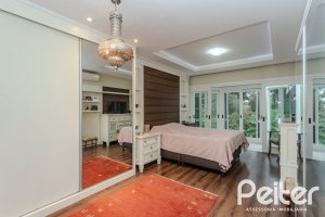 Casa em Condomínio à venda com 296m², 3 dormitórios, 1 suíte, 4 vagas, no bairro Terra Ville em PORTO ALEGRE