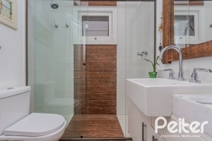 Casa em Condomínio à venda com 296m², 3 dormitórios, 1 suíte, 4 vagas, no bairro Terra Ville em PORTO ALEGRE
