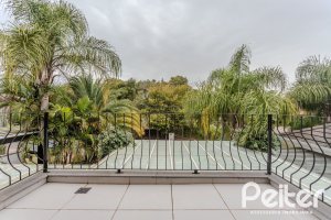 Casa em Condomínio à venda com 296m², 3 dormitórios, 1 suíte, 4 vagas, no bairro Terra Ville em PORTO ALEGRE