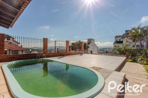 Casa à venda com 302m², 3 dormitórios, 1 suíte, 2 vagas, no bairro Espírito Santo em Porto Alegre