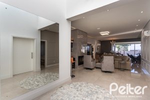 Casa em Condomínio à venda com 230m², 3 dormitórios, 3 suítes, 4 vagas, no bairro Alphaville em PORTO ALEGRE