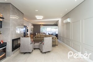 Casa em Condomínio à venda com 230m², 3 dormitórios, 3 suítes, 4 vagas, no bairro Alphaville em PORTO ALEGRE