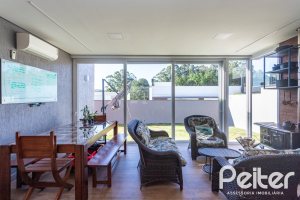 Casa em Condomínio à venda com 230m², 3 dormitórios, 3 suítes, 4 vagas, no bairro Alphaville em PORTO ALEGRE