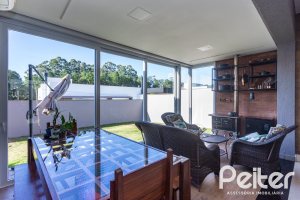 Casa em Condomínio à venda com 230m², 3 dormitórios, 3 suítes, 4 vagas, no bairro Alphaville em PORTO ALEGRE