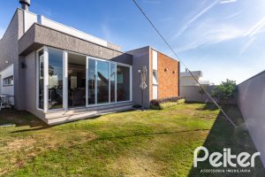 Casa em Condomínio à venda com 230m², 3 dormitórios, 3 suítes, 4 vagas, no bairro Alphaville em PORTO ALEGRE
