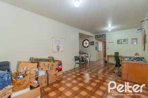Casa à venda com 241m², 5 dormitórios, 2 suítes, 3 vagas, no bairro Tristeza em Porto Alegre