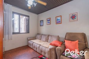 Casa à venda com 241m², 5 dormitórios, 2 suítes, 3 vagas, no bairro Tristeza em Porto Alegre