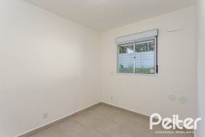 Apartamento à venda com 54m², 2 dormitórios, 1 suíte, 1 vaga, no bairro Camaquã em Porto Alegre