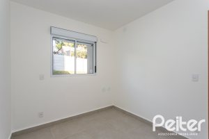 Apartamento à venda com 54m², 2 dormitórios, 1 suíte, 1 vaga, no bairro Camaquã em Porto Alegre