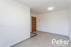 Apartamento à venda com 54m², 2 dormitórios, 1 suíte, 1 vaga, no bairro Camaquã em Porto Alegre