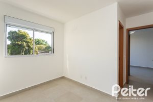 Apartamento à venda com 54m², 2 dormitórios, 1 suíte, 1 vaga, no bairro Camaquã em Porto Alegre