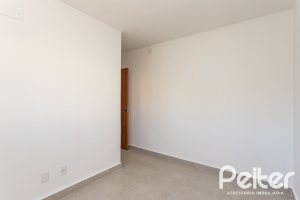 Apartamento à venda com 54m², 2 dormitórios, 1 suíte, 1 vaga, no bairro Camaquã em Porto Alegre