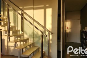Casa em Condomínio à venda com 197m², 3 dormitórios, 1 suíte, 2 vagas, no bairro Vila Nova em PORTO ALEGRE