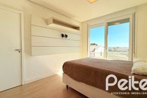 Casa em Condomínio à venda com 197m², 3 dormitórios, 1 suíte, 2 vagas, no bairro Vila Nova em PORTO ALEGRE