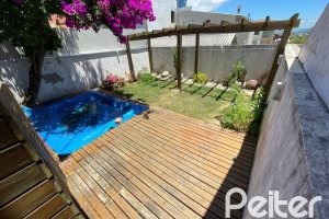 Casa em Condomínio à venda com 197m², 3 dormitórios, 1 suíte, 2 vagas, no bairro Vila Nova em PORTO ALEGRE