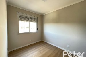 Apartamento à venda com 59m², 2 dormitórios, 1 vaga, no bairro Cavalhada em Porto Alegre