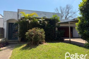 Casa à venda com 253m², 3 dormitórios, 1 suíte, 4 vagas, no bairro Jardim Isabel em Porto Alegre