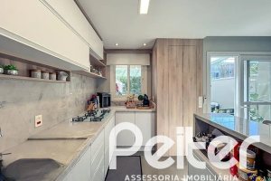 Casa em Condomínio à venda com 120m², 3 dormitórios, 1 suíte, 2 vagas, no bairro Vila Nova em PORTO ALEGRE