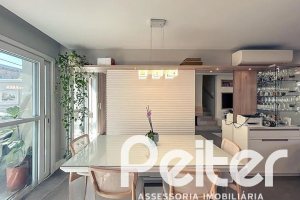 Casa em Condomínio à venda com 120m², 3 dormitórios, 1 suíte, 2 vagas, no bairro Vila Nova em PORTO ALEGRE