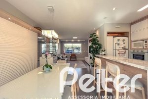 Casa em Condomínio à venda com 120m², 3 dormitórios, 1 suíte, 2 vagas, no bairro Vila Nova em PORTO ALEGRE