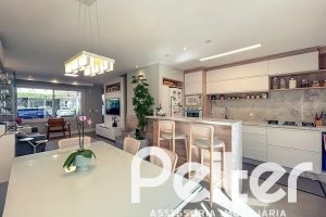 Casa em Condomínio à venda com 120m², 3 dormitórios, 1 suíte, 2 vagas, no bairro Vila Nova em PORTO ALEGRE