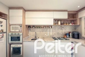 Casa em Condomínio à venda com 120m², 3 dormitórios, 1 suíte, 2 vagas, no bairro Vila Nova em PORTO ALEGRE
