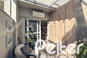 Casa em Condomínio à venda com 120m², 3 dormitórios, 1 suíte, 2 vagas, no bairro Vila Nova em PORTO ALEGRE