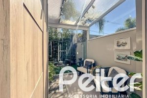Casa em Condomínio à venda com 120m², 3 dormitórios, 1 suíte, 2 vagas, no bairro Vila Nova em PORTO ALEGRE