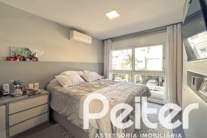 Casa em Condomínio à venda com 120m², 3 dormitórios, 1 suíte, 2 vagas, no bairro Vila Nova em PORTO ALEGRE