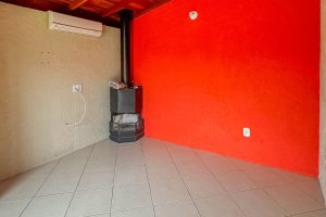 Casa em Condomínio à venda com 102m², 3 dormitórios, 1 suíte, 1 vaga, no bairro Guarujá em Porto Alegre