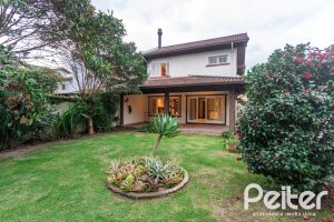 Casa em Condomínio à venda com 216m², 2 dormitórios, 2 suítes, 2 vagas, no bairro Terra Ville em PORTO ALEGRE